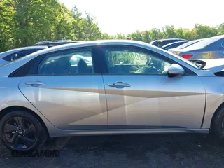 2023 Hyundai Elantra SEL z VIN 5NPLM4AG0PH107972, wystawiony jako IAAI lot #42200000 z przebiegiem 15 060 mil mil oraz . Historia ofert i sprzedaży dostępna na DreamBid. Obrazek 12.