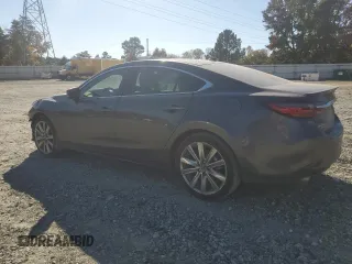 2021 Mazda 6 Signature with VIN JM1GL1XY0M1617051, listed as a Copart auction lot 76715774 with 43,925 mi miles and Salvage Title. Bid and sale history available at DreamBid. Image 2.