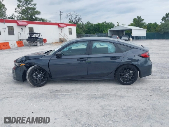 2025 Honda Civic Sport z VIN 19XFL2H83SE012838, wystawiony jako IAAI lot #42201903 z przebiegiem 4168 mil mil oraz . Historia ofert i sprzedaży dostępna na DreamBid. Obrazek 14.