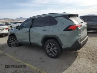 2023 Toyota RAV4 Hybrid XLE Premium z VIN 4T3B6RFV8PU129611, wystawiony jako Copart lot #52424075 z przebiegiem 30 595 mil mil oraz Szkoda całkowita • Salvage title. Historia ofert i sprzedaży dostępna na DreamBid. Obrazek 2.