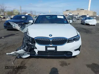 2020 BMW 3 Series 330i xDrive with VIN 3MW5R7J08L8B09946, listed as a IAAI auction lot 41989250 with 33,921 mi miles and . Bid and sale history available at DreamBid. Image 12.