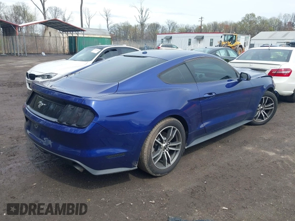 2015 Ford Mustang EcoBoost with VIN 1FA6P8TH9F5317329, listed as a IAAI auction lot 41966041 with 61,357 mi miles and . Bid and sale history available at carsss.com. Image 4.