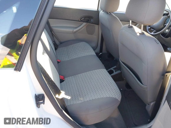 2007 Ford Focus S with VIN 1FAHP34N67W244433, listed as a IAAI auction lot 41539078 with 107,318 mi miles and . Bid and sale history available at DreamBid. Image 8.