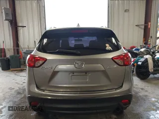 2015 Mazda CX-5 Sport z VIN JM3KE2BE8F0434889, wystawiony jako IAAI lot #42259894 z przebiegiem 298 835 mil mil oraz . Historia ofert i sprzedaży dostępna na DreamBid. Obrazek 16.