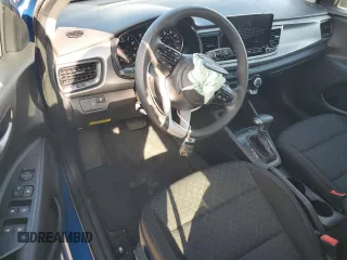 2023 Kia Rio S with VIN 3KPA25AD9PE548173, listed as a Copart auction lot 50232915 with 26,668 mi miles and Salvage Title. Bid and sale history available at DreamBid. Image 8.