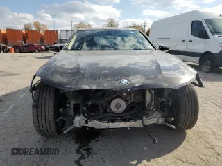 2018 BMW 7 Series 740i xDrive with VIN WBA7E4C54JGV23901, listed as a Copart auction lot 77322824 with 70,922 mi miles and Salvage Title. Bid and sale history available at carsss.com. Image 5.