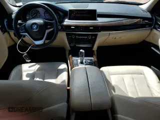 2016 BMW X5 xDrive35i z VIN 5UXKR0C56G0U49651, wystawiony jako Copart lot #55655905 z przebiegiem 104 944 mil mil oraz Szkoda całkowita • Salvage title. Historia ofert i sprzedaży dostępna na DreamBid. Obrazek 8.