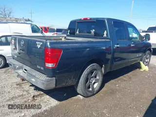 2005 Nissan Titan XE with VIN 1N6AA07A65N512479, listed as a IAAI auction lot 41659482 with 225,037 mi miles and . Bid and sale history available at DreamBid. Image 4.