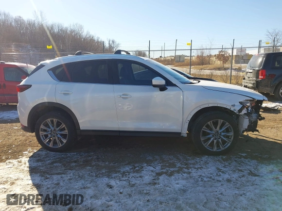 2020 Mazda CX-5 Grand Touring with VIN JM3KFADM5L1815374, listed as a IAAI auction lot 41416077 with 44,190 mi miles. Bid and sale history available at carsss.com. Image 12.