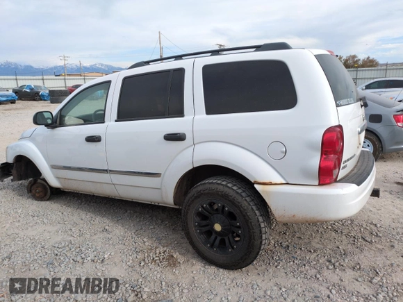 2005 Dodge Durango SLT with VIN 1D4HB48D95F529241, listed as a Copart auction lot 58195995 with 243,097 mi miles and Salvage title. Bid and sale history available at DreamBid. Image 2.