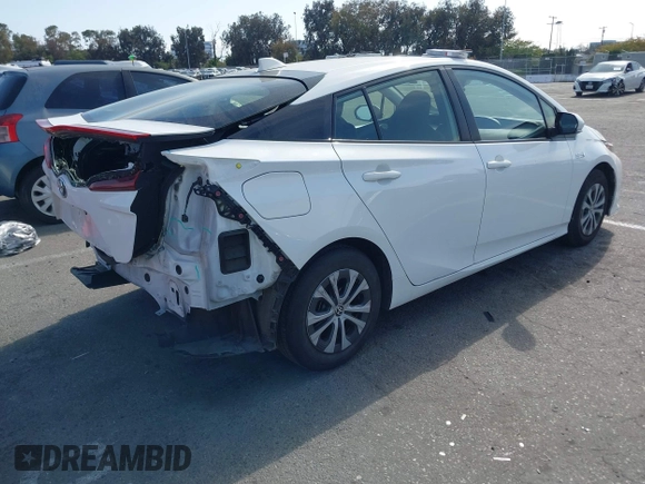 2021 Toyota Prius LE with VIN JTDKAMFP7M3197111, listed as a IAAI auction lot 42031569 with 240,098 mi miles and . Bid and sale history available at DreamBid. Image 4.