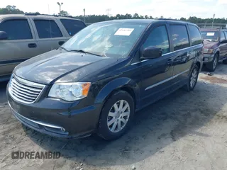 2016 Chrysler Town & Country Touring with VIN 2C4RC1BG8GR297243, listed as a IAAI auction lot 42143705 with 140,728 mi miles. Bid and sale history available at carsss.com. Image 2.