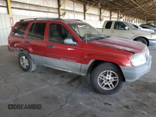 2002 Jeep Grand Cherokee with VIN 1J4GX38S52C166298, listed as a Copart auction lot 80655884 with 212,113 mi miles and Salvage title. Bid and sale history available at DreamBid. Image 4.