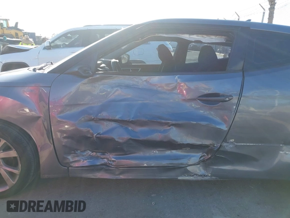 2016 Hyundai Veloster with VIN KMHTC6AD3GU283985, listed as a IAAI auction lot 41872103 with 153,949 mi miles. Bid and sale history available at carsss.com. Image 6.