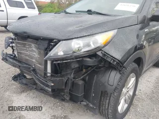 2012 Kia Sportage LX with VIN KNDPBCA27C7206731, listed as a IAAI auction lot 42056238 with 67,926 mi miles and . Bid and sale history available at DreamBid. Image 6.