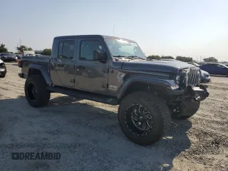 2022 Jeep Gladiator High Altitude with VIN 1C6HJTFG2NL114665, listed as a Copart auction lot 59818015 with 29,246 mi miles and Salvage title. Bid and sale history available at DreamBid. Image 4.