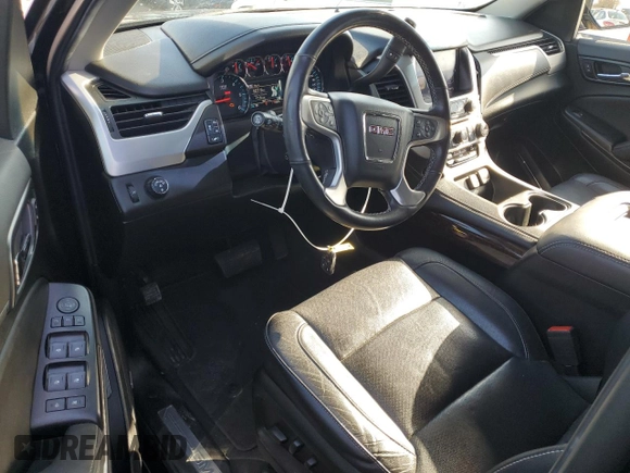 2019 GMC Yukon SLT with VIN 1GKS1BKC0KR321175, listed as a Copart auction lot 84092224 with 99,711 mi miles and Salvage Title. Bid and sale history available at carsss.com. Image 8.