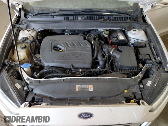 2015 Ford Fusion SE z VIN 3FA6P0HD3FR109984, wystawiony jako Copart lot #59847705 z przebiegiem 152 480 mil mil oraz Szkoda całkowita • Salvage title. Historia ofert i sprzedaży dostępna na DreamBid. Obrazek 11.