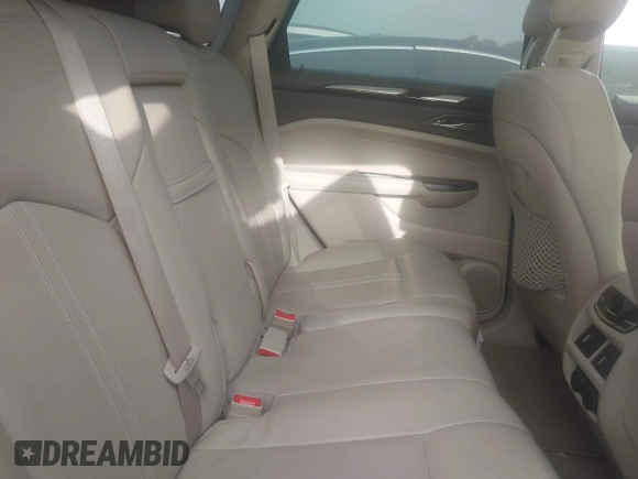 2014 Cadillac SRX Premium Collection with VIN 3GYFNDE36ES564140, listed as a IAAI auction lot 42070008 with 69,768 mi miles and . Bid and sale history available at DreamBid. Image 8.