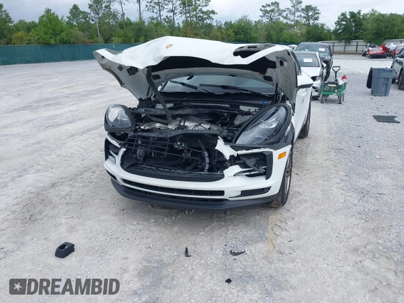 2021 Porsche Macan with VIN WP1AA2A52MLB06086, listed as a IAAI auction lot 39423611 with 56,559 mi miles and . Bid and sale history available at DreamBid. Image 12.