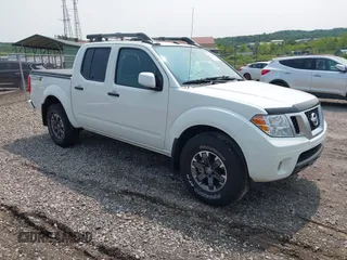 2020 Nissan Frontier SV z VIN 1N6ED0EB2LN716262, wystawiony jako IAAI lot #42392068 z przebiegiem 33 385 mil mil oraz . Historia ofert i sprzedaży dostępna na DreamBid. Obrazek 1.