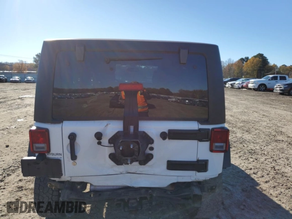 2018 Jeep Wrangler JK Unlimited Sport S with VIN 1C4BJWDG2JL879078, listed as a Copart auction lot 84290864 with 24,457 mi miles and Salvage Title. Bid and sale history available at carsss.com. Image 6.