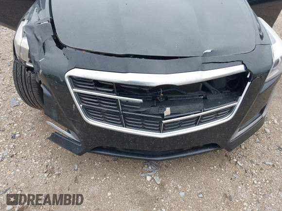 2014 Cadillac CTS Luxury AWD with VIN 1G6AX5SX9E0197395, listed as a IAAI auction lot 42211452 with 90,657 mi miles and . Bid and sale history available at DreamBid. Image 6.