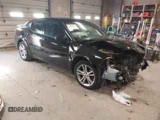 2014 Dodge Avenger SXT z VIN 1C3CDZCB3EN156146, wystawiony jako IAAI lot #42000054 z przebiegiem 149 166 mil mil oraz . Historia ofert i sprzedaży dostępna na DreamBid. Obrazek 1.