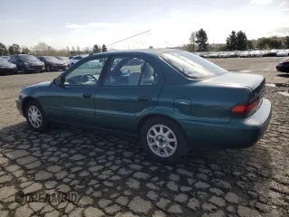1996 Chevrolet Prizm z VIN 1Y1SK5285TZ058572, wystawiony jako Copart lot #51303845 z przebiegiem 87 109 mil mil oraz Szkoda całkowita • Salvage title. Historia ofert i sprzedaży dostępna na DreamBid. Obrazek 2.