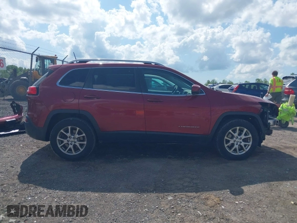 2016 Jeep Cherokee Latitude z VIN 1C4PJMCB9GW305472, wystawiony jako IAAI lot #42276395 z przebiegiem 112 621 mil mil oraz . Historia ofert i sprzedaży dostępna na DreamBid. Obrazek 14.