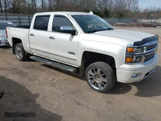 2015 Chevrolet Silverado 1500 High Country with VIN 3GCUKTEC7FG205805, listed as a IAAI auction lot 41815859 with 130,028 mi miles. Bid and sale history available at carsss.com. Image 1.