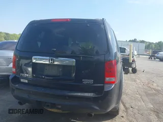 2012 Honda Pilot Touring with VIN 5FNYF4H95CB026191, listed as a IAAI auction lot 42021987 with 229,273 mi miles and . Bid and sale history available at DreamBid. Image 16.