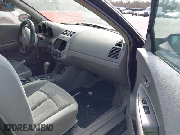 2002 Nissan Altima S with VIN 1N4AL11D52C178433, listed as a IAAI auction lot 41792610 with 216,659 mi miles. Bid and sale history available at carsss.com. Image 5.