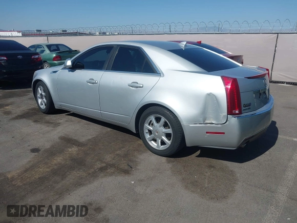 2009 Cadillac CTS RWD z VIN 1G6DU57VX90143820, wystawiony jako IAAI lot #42450086 z przebiegiem 170 656 mil mil oraz . Historia ofert i sprzedaży dostępna na DreamBid. Obrazek 3.