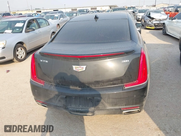2019 Cadillac XTS Luxury with VIN 2G61M5S38K9100792, listed as a IAAI auction lot 41676187 with 103,056 mi miles and . Bid and sale history available at DreamBid. Image 16.