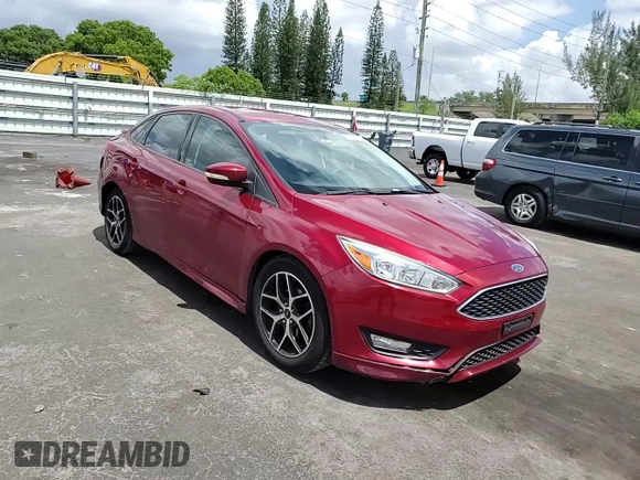 2015 Ford Focus SE z VIN 1FADP3F24FL332883, wystawiony jako Copart lot #64429655 z przebiegiem 65 939 mil mil oraz Szkoda całkowita • Salvage title. Historia ofert i sprzedaży dostępna na DreamBid. Obrazek 13.