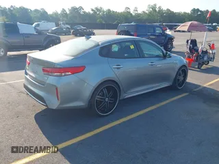2017 Kia Optima z VIN KNAGT4LE2H5014899, wystawiony jako IAAI lot #42578989 z przebiegiem 110 363 mil mil oraz . Historia ofert i sprzedaży dostępna na DreamBid. Obrazek 4.