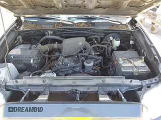 2020 Toyota Tacoma SR with VIN 3TYRX5GNXLT002488, listed as a IAAI auction lot 41973584 with 76,169 mi miles and . Bid and sale history available at DreamBid. Image 10.