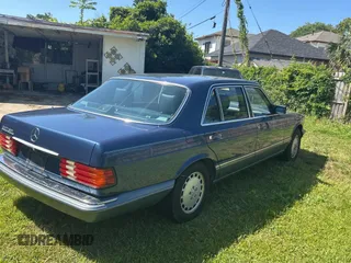 1988 Mercedes-Benz 560 with VIN WDBCA39D0JA421504, listed as a Copart auction lot 52342525 with 82,277 mi miles and Clean Title. Bid and sale history available at DreamBid. Image 4.