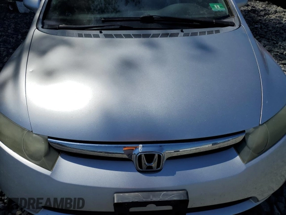 2008 Honda Civic LX z VIN 2HGFA16558H308659, wystawiony jako Copart lot #57152335 z przebiegiem Nie podano mil oraz Szkoda całkowita • Salvage title. Historia ofert i sprzedaży dostępna na DreamBid. Obrazek 11.