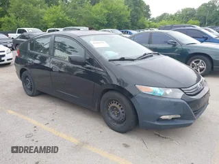 2011 Honda Insight LX with VIN JHMZE2H50BS012742, listed as a IAAI auction lot 42488795 with 254,853 mi miles and . Bid and sale history available at DreamBid. Image 1.