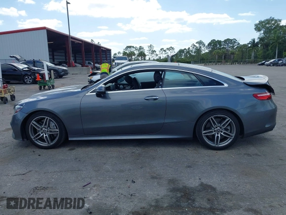 2018 Mercedes-Benz E 400 with VIN WDD1J6FB9JF015064, listed as a IAAI auction lot 42165914 with 95,290 mi miles and . Bid and sale history available at DreamBid. Image 15.