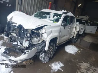 2016 Toyota Tacoma SR with VIN 3TMCZ5AN5GM004885, listed as a IAAI auction lot 41569409 with 143,951 mi miles. Bid and sale history available at carsss.com. Image 2.