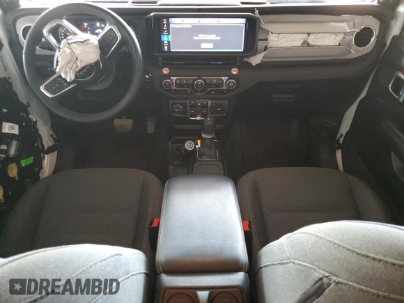 2024 Jeep Wrangler Sahara with VIN 1C4RJXP67RW223380, listed as a Copart auction lot 52192095 with 18,326 mi miles and Salvage Title. Bid and sale history available at DreamBid. Image 8.