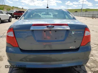 2012 Ford Fusion Hybrid z VIN 3FADP0L3XCR176552, wystawiony jako Copart lot #55787415 z przebiegiem 156 806 mil mil oraz Szkoda całkowita • Salvage title. Historia ofert i sprzedaży dostępna na DreamBid. Obrazek 6.