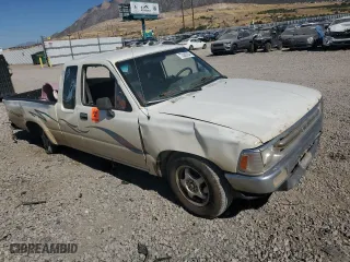 1990 Toyota 2WD Pickups DX with VIN JT4RN93P1L5010999, listed as a Copart auction lot 73386934 with 321,820 mi miles and Salvage Title. Bid and sale history available at carsss.com. Image 4.