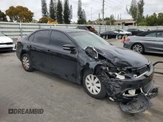 2012 Volkswagen Jetta Sedan SE w/Convenience with VIN 3VWDX7AJ9CM317030, listed as a Copart auction lot 50404025 with 147,237 mi miles and Salvage Title. Bid and sale history available at carsss.com. Image 4.