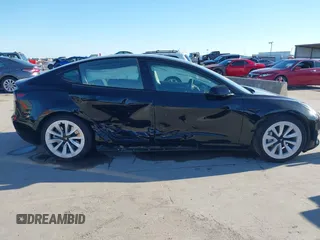 2023 Tesla Model 3 z VIN 5YJ3E1EA4PF552103, wystawiony jako IAAI lot #40782218 z przebiegiem 20 997 mil mil oraz . Historia ofert i sprzedaży dostępna na DreamBid. Obrazek 13.