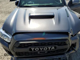 2022 Toyota Tacoma SR z VIN 3TYCZ5AN8NT076536, wystawiony jako Copart lot #55268985 z przebiegiem 57 697 mil mil oraz Szkoda całkowita • Salvage title. Historia ofert i sprzedaży dostępna na DreamBid. Obrazek 11.