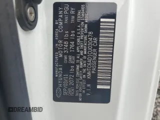 2012 Hyundai Veloster w/Black Int z VIN KMHTC6AD1CU030478, wystawiony jako Copart lot #62715005 z przebiegiem 127 625 mil mil oraz Szkoda całkowita • Salvage title. Historia ofert i sprzedaży dostępna na DreamBid. Obrazek 13.